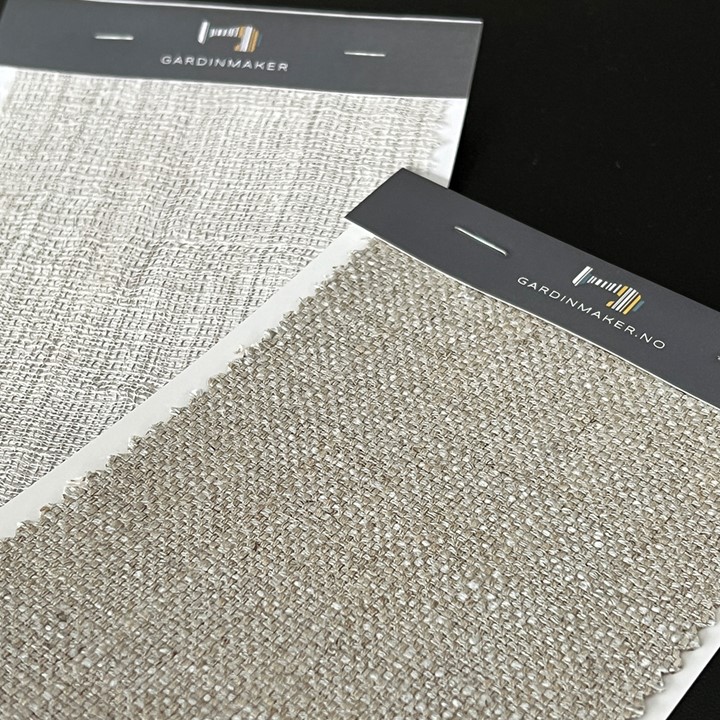Tekstilprøver fra Gardinmaker i greige tekstiler fra Designers Guild og Kirkby Design. Foto.